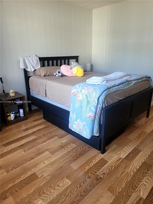 bedroom featuring light hardwood / wood-style flooring