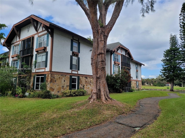 view of property exterior featuring a yard