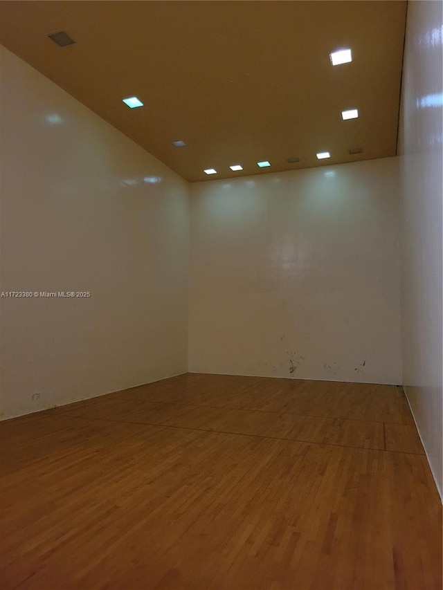 empty room featuring hardwood / wood-style floors