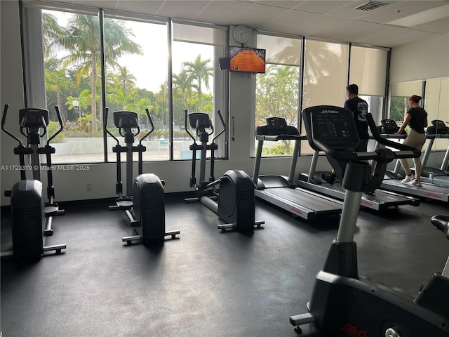 gym with visible vents and a wealth of natural light