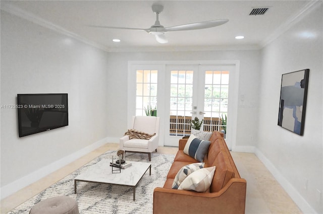 living room with crown molding, french doors, and ceiling fan