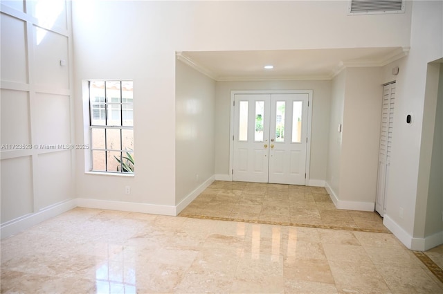 foyer entrance with ornamental molding