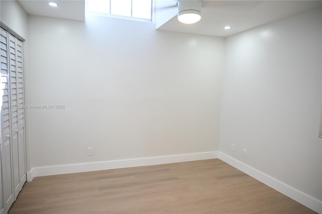 unfurnished room featuring light hardwood / wood-style flooring