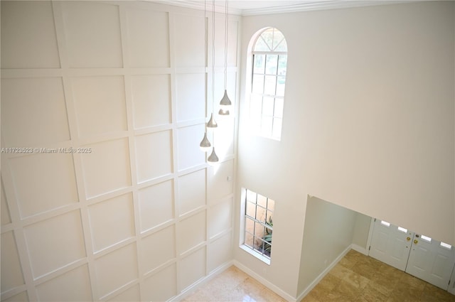 interior space featuring ornamental molding