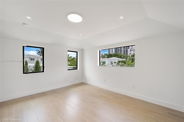 empty room with light hardwood / wood-style floors