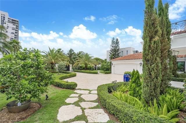 view of yard featuring a garage