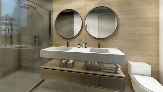 bathroom with walk in shower, tile patterned floors, sink, and toilet