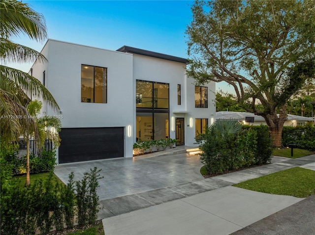 contemporary house featuring a garage