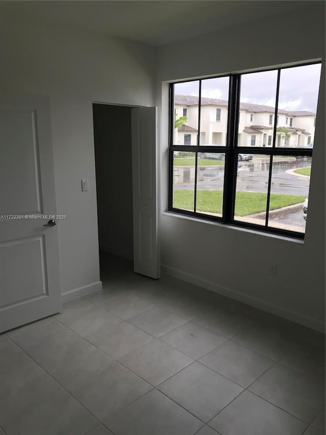 view of tiled empty room