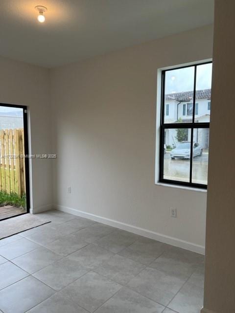 view of tiled empty room