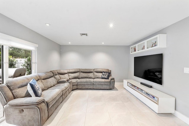 living room featuring light tile patterned floors