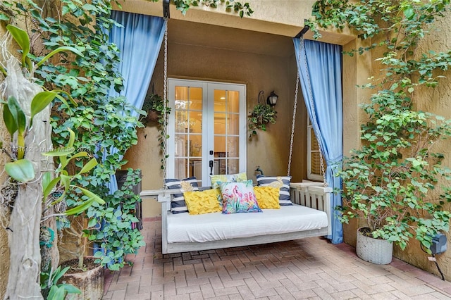 property entrance featuring french doors