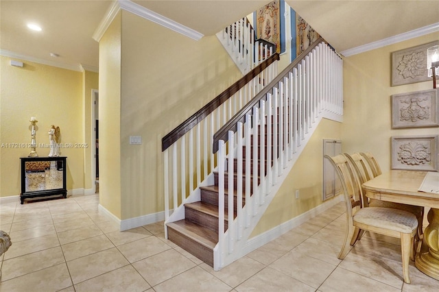 stairway featuring tile patterned floors and ornamental molding