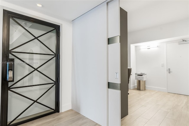 interior space with light hardwood / wood-style floors