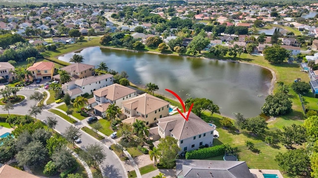 drone / aerial view featuring a water view