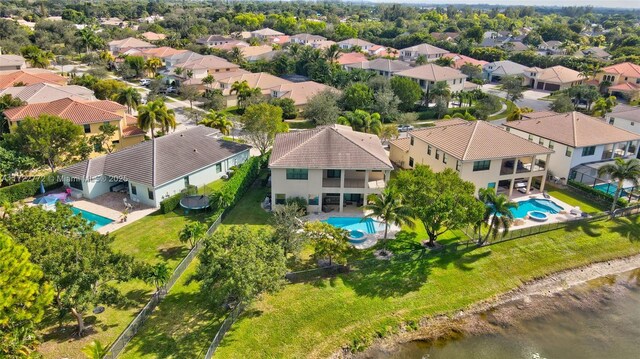 drone / aerial view with a water view