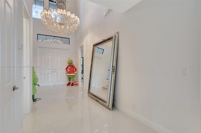 entrance foyer with an inviting chandelier