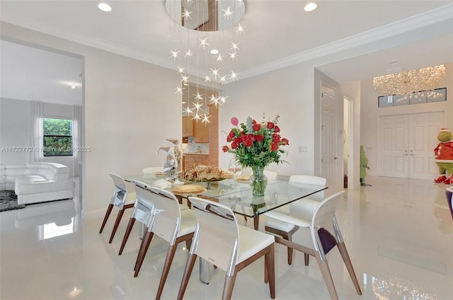 dining area featuring crown molding and an inviting chandelier