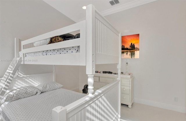 bedroom with ornamental molding