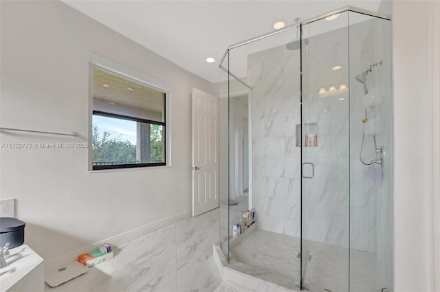 bathroom featuring an enclosed shower