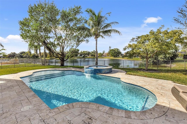 view of pool with an in ground hot tub, a water view, and a patio area