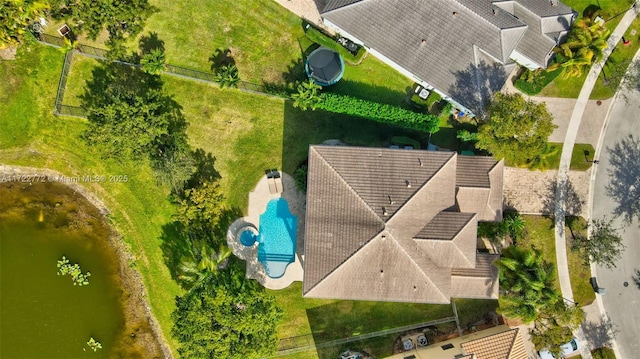 drone / aerial view with a water view