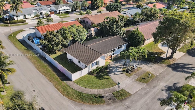 birds eye view of property with a residential view