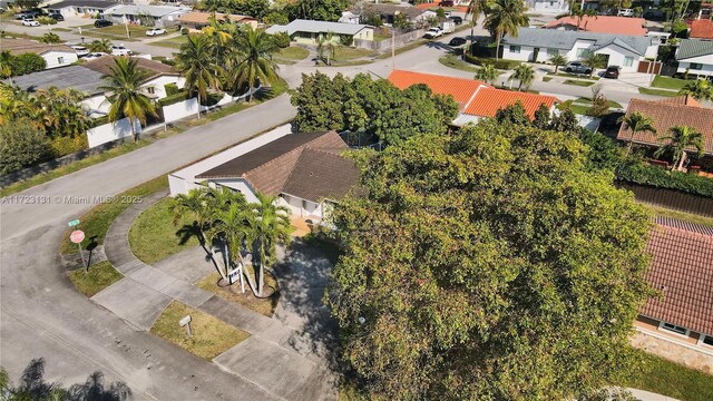 birds eye view of property with a residential view