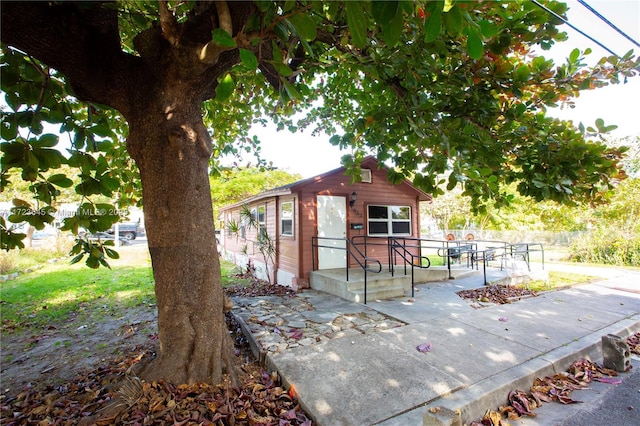 view of front facade with a patio area