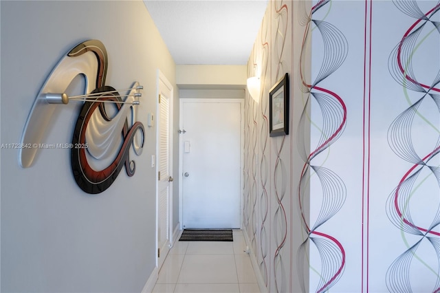 hallway with light tile patterned floors