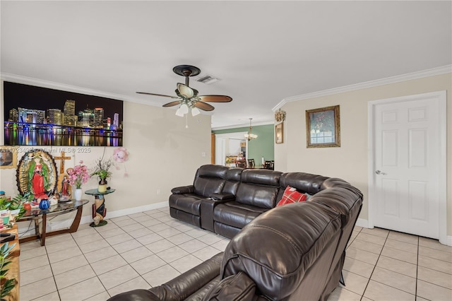 living room featuring ceiling fan, ornamental molding, and light tile patterned floors