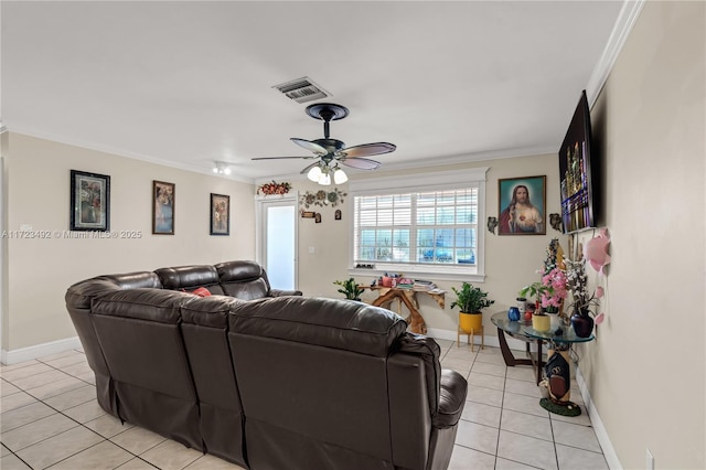 tiled living room with ceiling fan and ornamental molding