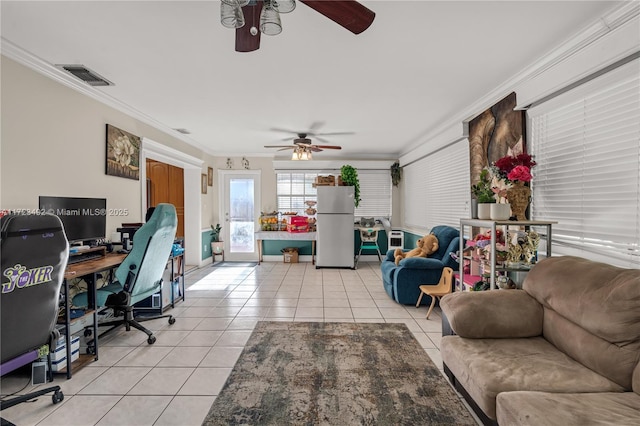 tiled office featuring ceiling fan and ornamental molding