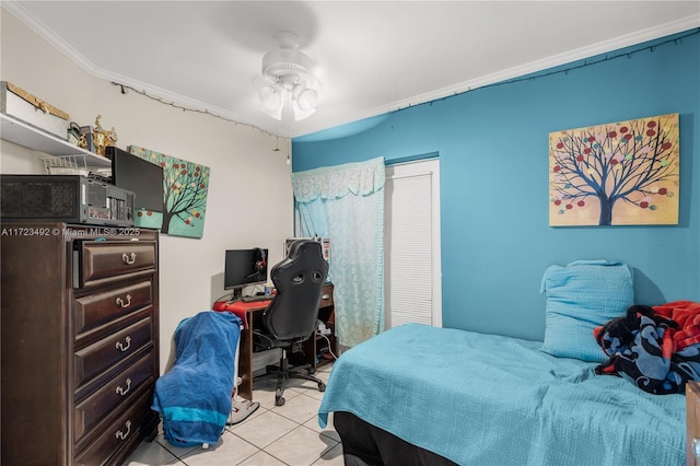 bedroom with crown molding and light tile patterned flooring