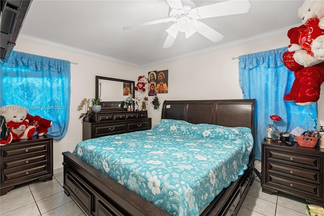 bedroom featuring ceiling fan, light tile patterned floors, and ornamental molding