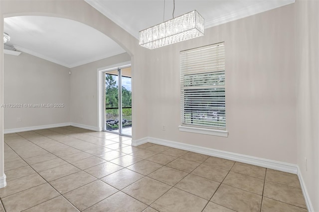 unfurnished room featuring light tile patterned floors, crown molding, and a notable chandelier