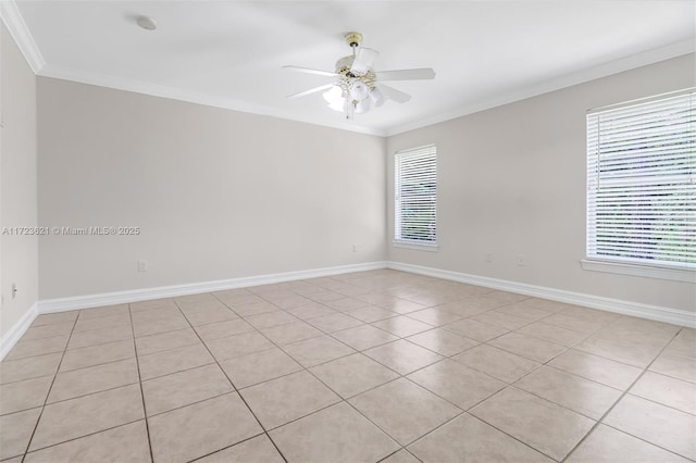 unfurnished room featuring crown molding, light tile patterned floors, and a healthy amount of sunlight