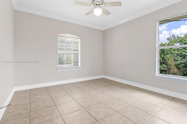 empty room with light tile patterned floors, ceiling fan, and ornamental molding