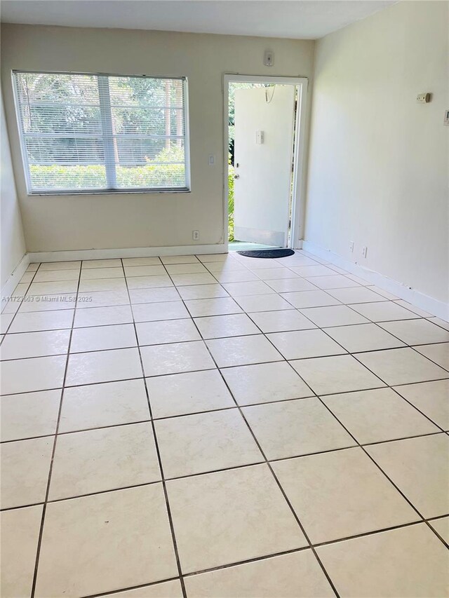 interior space featuring light tile patterned floors