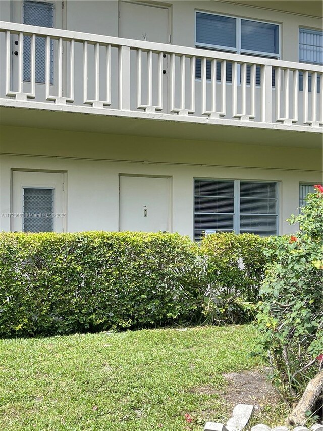 doorway to property with a balcony