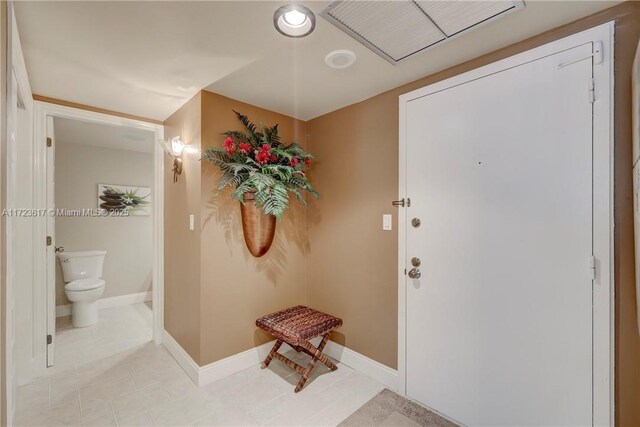 living room with crown molding and hardwood / wood-style flooring