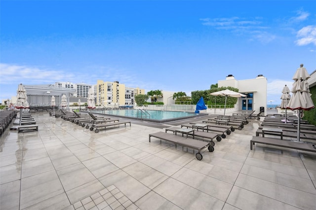 view of pool featuring a patio