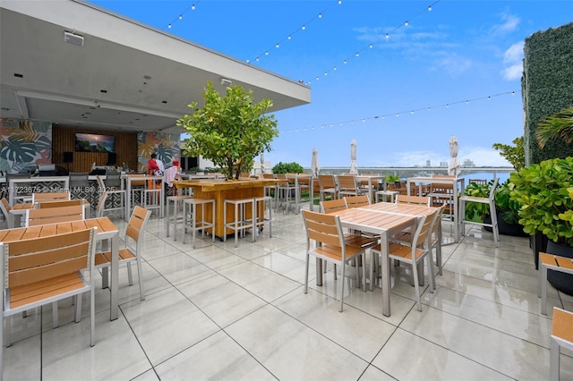 view of patio with an outdoor bar