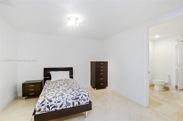 tiled bedroom with connected bathroom