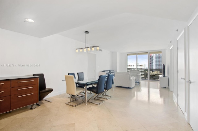 dining room featuring floor to ceiling windows