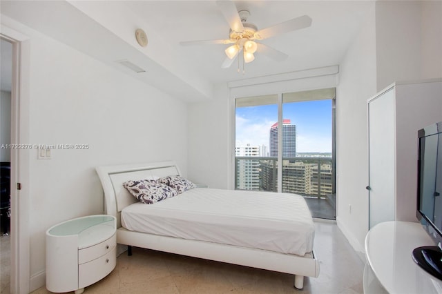 bedroom featuring access to outside and ceiling fan