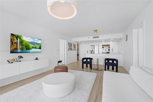 living room with light wood-type flooring