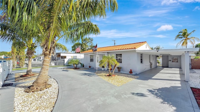 view of front of home featuring a carport