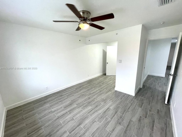 unfurnished room featuring ceiling fan and light hardwood / wood-style floors