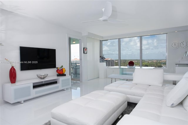 living room featuring ceiling fan